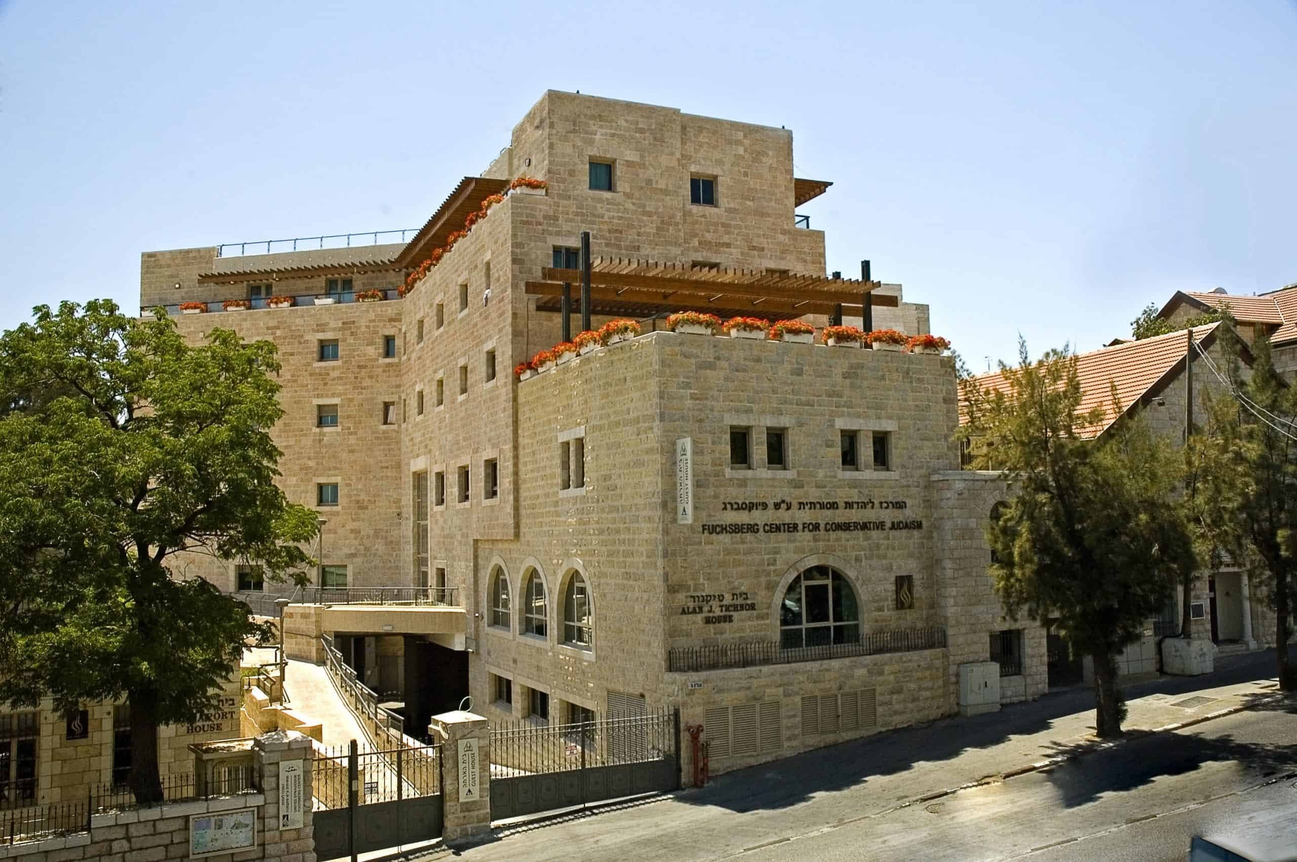 The Fuchsberg Center, a stone building with flower-lined terraces on Agron Street, Rehavia